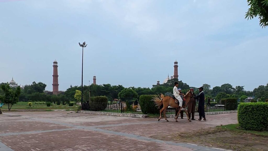 Horse Riding and Badshahi Masjid in Background